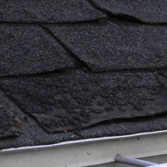 Roof-shingles-broken