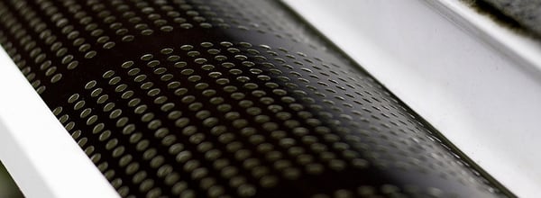 Perforations of a leaf guard up close